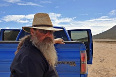 Finchy at Mt Greenly near Coffin Bay beside blue Raptor ute