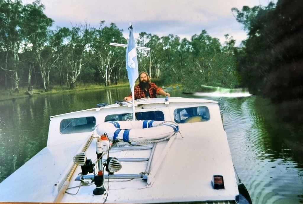 Huck's poles, boathook, flag and buoy